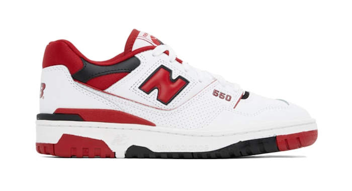 Side view of a white, red, and black New Balance sneaker.